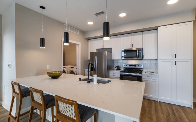 Galley style Kitchen that overlooks into the living room